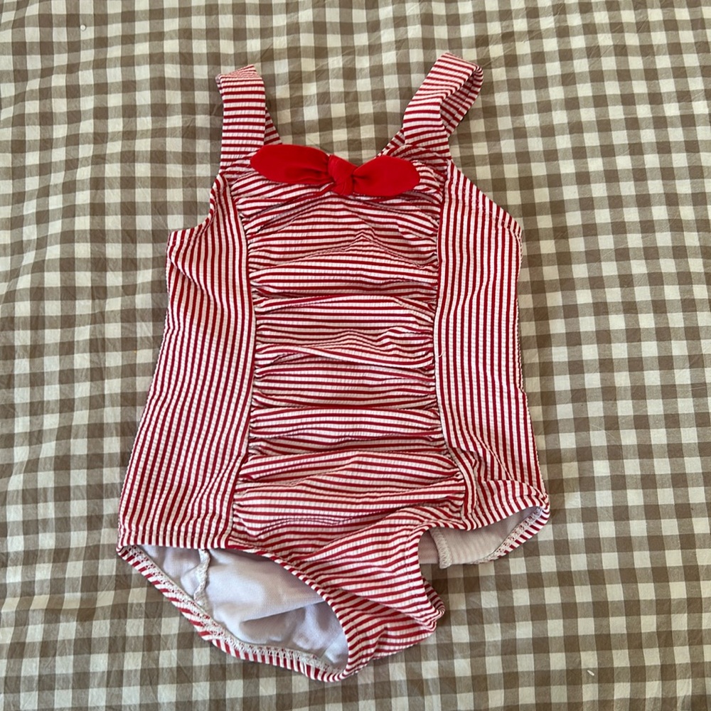 Red and white striped children’s swimsuit